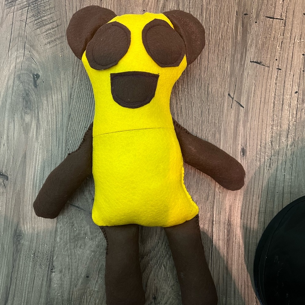 Yellow and brown panda bear